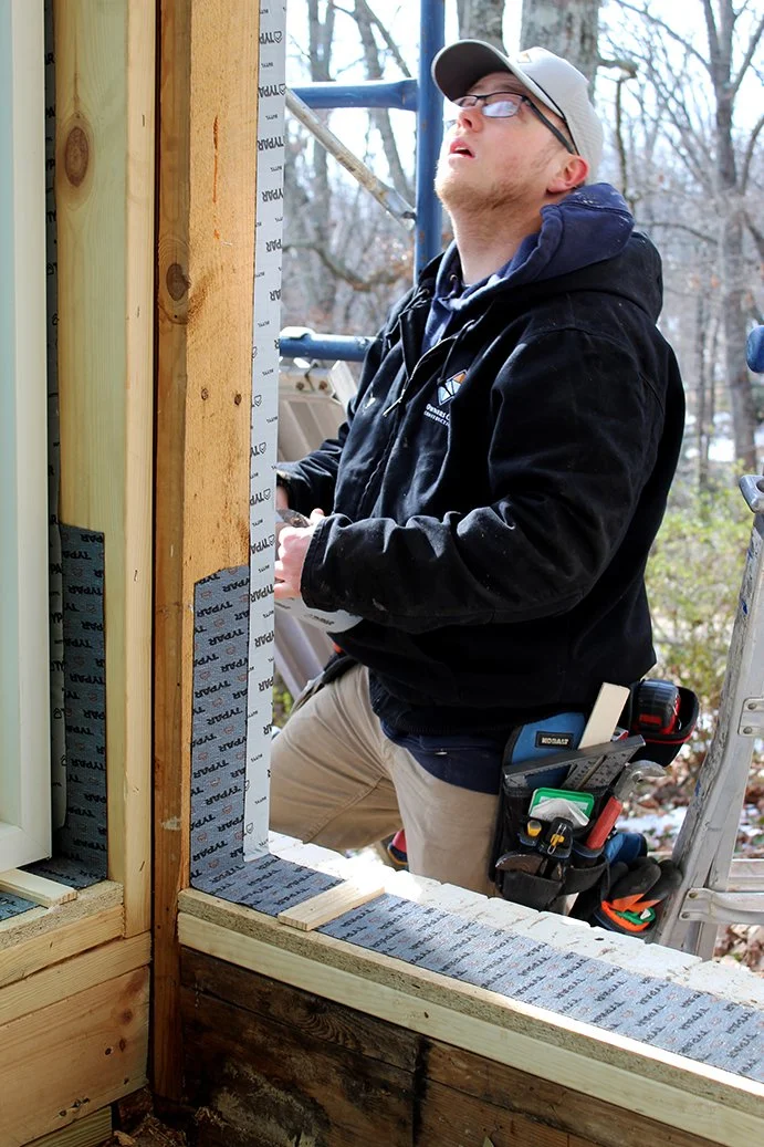 An Owners Choice carpenter rebuilding a window opening